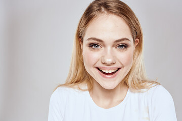 emotional blonde white t-shirt close-up studio lifestyle fun