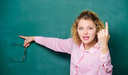 explanation. back to school. empty blackboard. girl teacher at school lesson. student glasses at blackboard. Formal informal and nonformal education. new school year. Girl prepare for exams