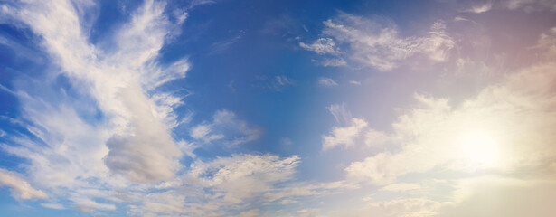 White clouds on blue sky, day skyline panorama