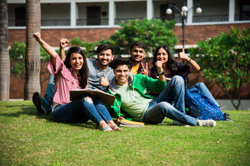 Education is fun - Cheerful Indian asian young students enjoying togetherness in college campus