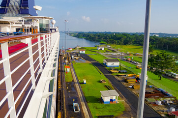 Almost no space between modern cruiseship or cruise ship liner and concrete walls of Panama Canal...