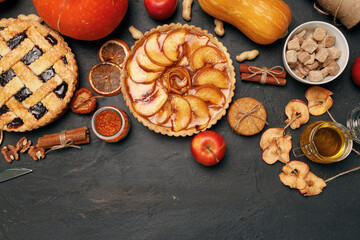 Berry tart pie and apple tart pie on black background