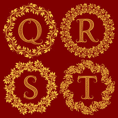 Q, R, S, T vintage monograms in floral wreath. Golden monograms in baroque style on maroon background.