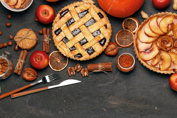 Berry tart pie and apple tart pie on black background