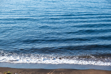 Holiday destination concept. Blue calm sea background