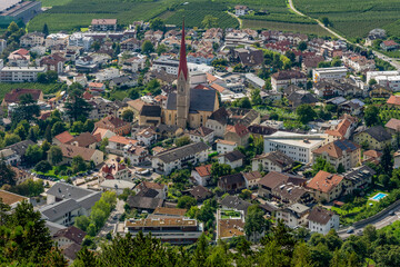 Fototapeta na wymiar Superb aerial view of the old town of Silandro, South Tyrol, Italy, on a sunny day