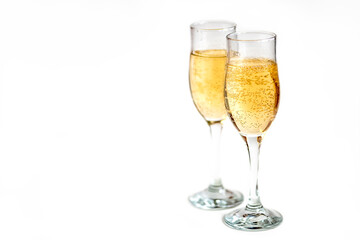two glasses of champagne on white background