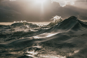 breaking sun with heavy waves 