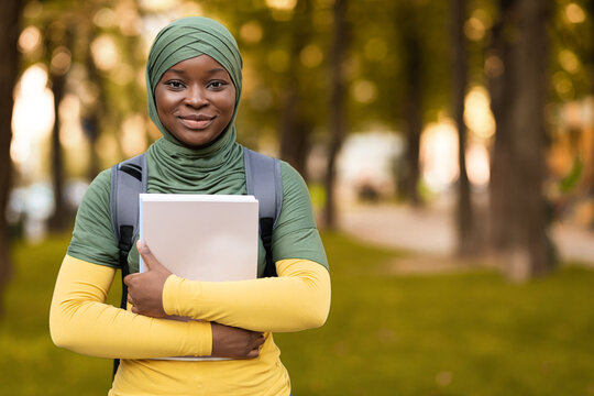 Education For Muslim Women. Black Student Lady In Hijab Posing Outdoors