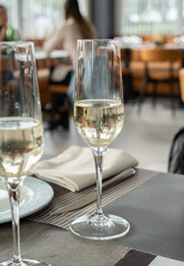 glasses of prosecco on a table in restaurant

