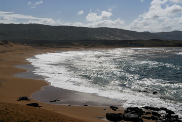 Horseshoe bay on remote three mile Moomomi Beach Molokai