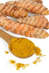 tumeric root isolated on white background