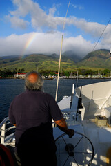 Captain steering the Molokai princess into the Lahaina Harbour Maui