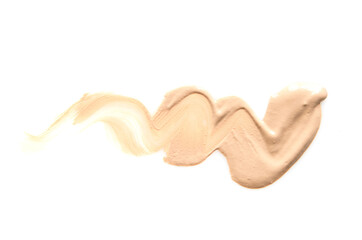 Beige makeup smear of creamy foundation isolated on white background. The concept of fashion and beauty industry. - Image