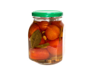 pickled tomatoes in glass jar on a white background isolated