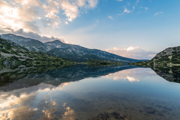 Fototapeta premium Popovo lake at Bezbog, Bulgaria and mountains reflection.