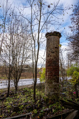 Obraz premium old abandoned red brick building on autumn sad day