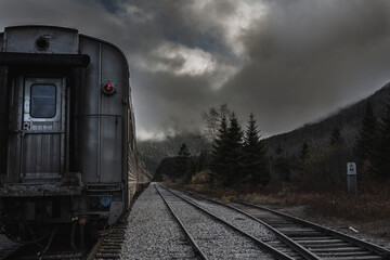 Obraz premium Train in Cloudy and Foggy Mountains Steel Palette