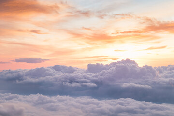View at sunrise with puffy foggy. White puffy like cloud stretching to foggy horizon in the bright morning.