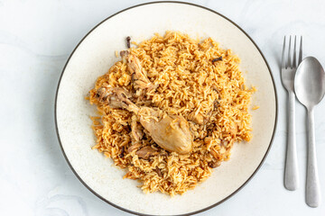 Traditional Indian Chicken Pilaf on a White Dish Top Down Horizontal Photo