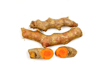 Turmeric roots and turmeric sliced isolated on white background