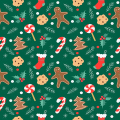 Naklejka premium vector seamless pattern on a christmas theme with hand drawn ginger cookies, snowflakes, spruce branches, sweets, socks, holly leaves on a dark green background