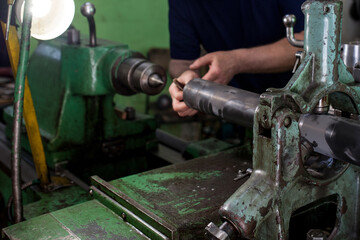 Professional works, the milling process for metal parts, metal machinery in large industrial plants-image