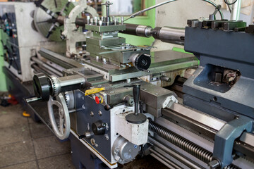 Professional works, the milling process for metal parts, metal machinery in large industrial plants-image