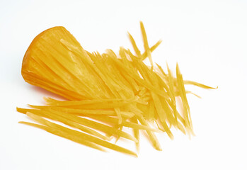 Closeup photo of red carrot slice peel or cut into several pieces and stuck on a white background cut isolated.