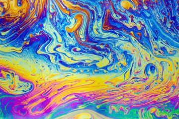 Psychedelic multicolored patterns background. Photo macro shot of soap bubbles