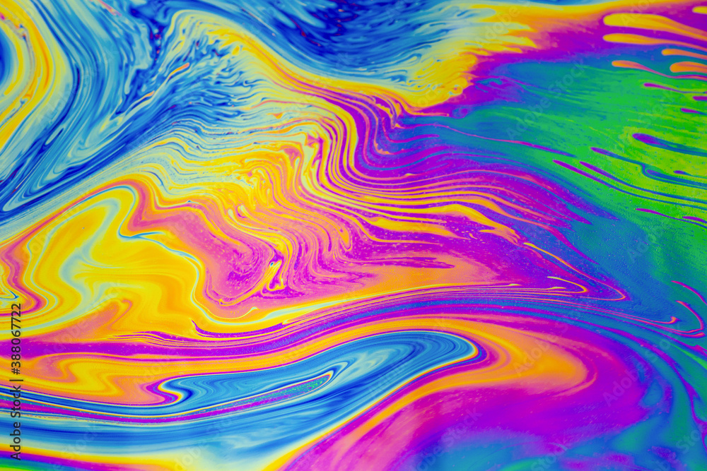Wall mural psychedelic multicolored patterns background. photo macro shot of soap bubbles