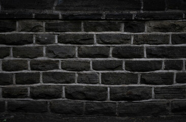 Old Textured Black Stone Wall Background