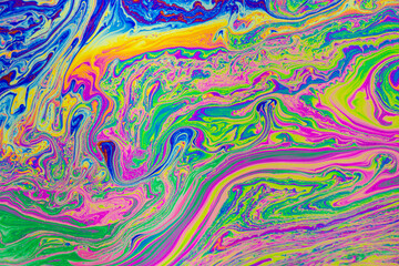 Psychedelic multicolored patterns background. Photo macro shot of soap bubbles