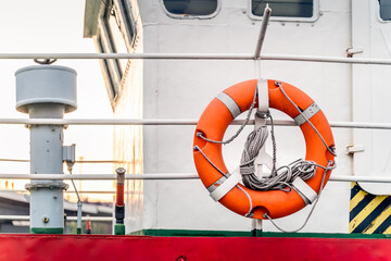 Close up on lifebuoys equipped on fireboat or firefighter ship. Anchored on Rampart of Brave pier in Szczecin, Poland