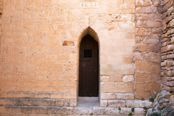 Fototapeta na wymiar Old wood door from a medieval town in Spain.