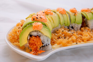 Avocado tempura maki with spicy mayo sauce