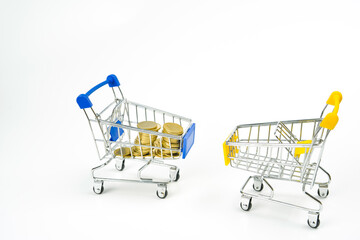 business and finance saving activity with  gold coin arrange in cart with white isolated background