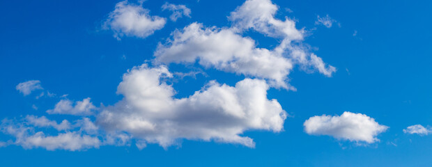 Obraz na płótnie Canvas Panorama of blue sky with white clouds