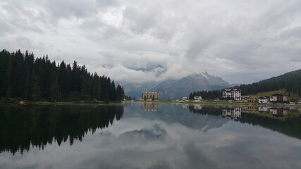 Fototapeta na wymiar Dolomiti lake Clouds Mountains