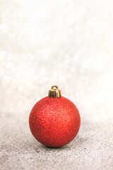 Merry Christmas.Christmas red ball and snowflake over Christmas bokeh lights background