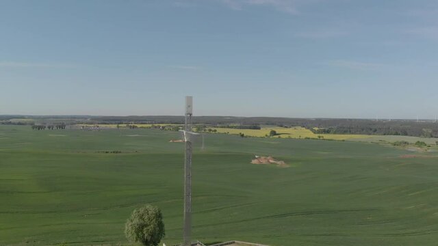 Cross dedicated to Pope John Paul II on the edge of town. Pilgrims destination in Pelplin, Pomerania, Poland.