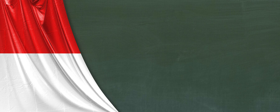 Flagge vom Bundesland Hessen auf einer Schultafel als Banner.