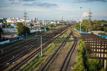 Urban landscape of a city and a railroad. Upper view