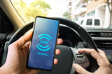 Pairing Smartphone with Car system through UWB or ultra wireband radio technology. Hands Free Talking and Listening Online Music While Traveling by Car.