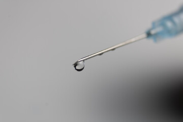 syringe needle with drop in the tip