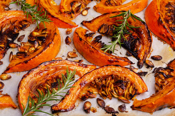 Baked pumpkin slices with seeds