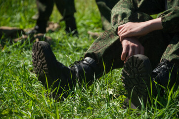 Military camp. Soldier boots