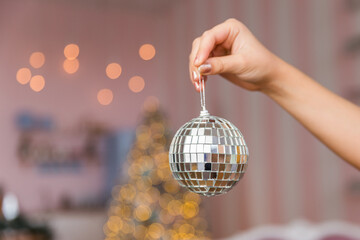 christmas ball in hand