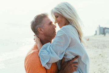 Obraz premium Happy senior couple spending time at the beach. Concepts about love,seniority and people