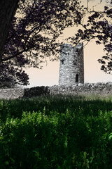 Ancient Irish Round Tower at Sunrise